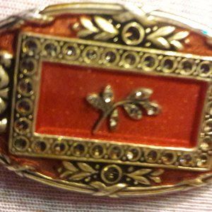 Catherine Popesco oval brooch: La Vie Parisienne